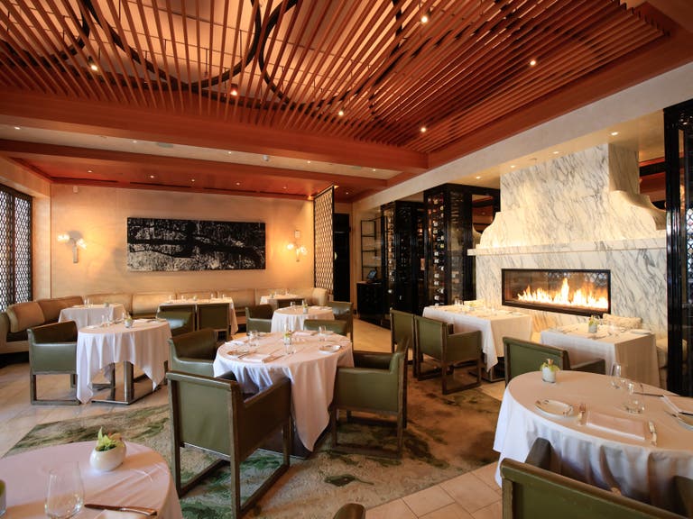 Wolfgang Puck at Hotel Bel-Air dining room and fireplace
