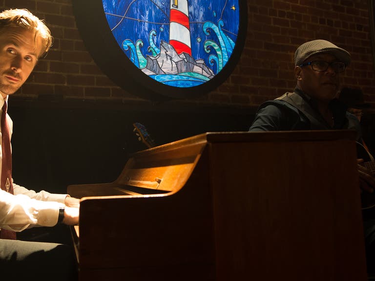 Ryan Gosling at the Lighthouse Cafe in a scene from "La La Land"