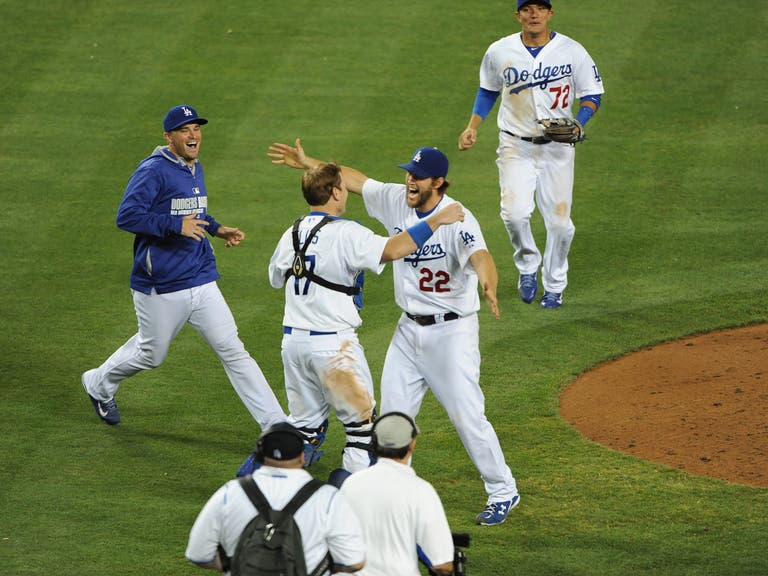 The Dodgers celebrate Clayton Kershaw's no-hitter at Dodger Stadium on June 18, 2014