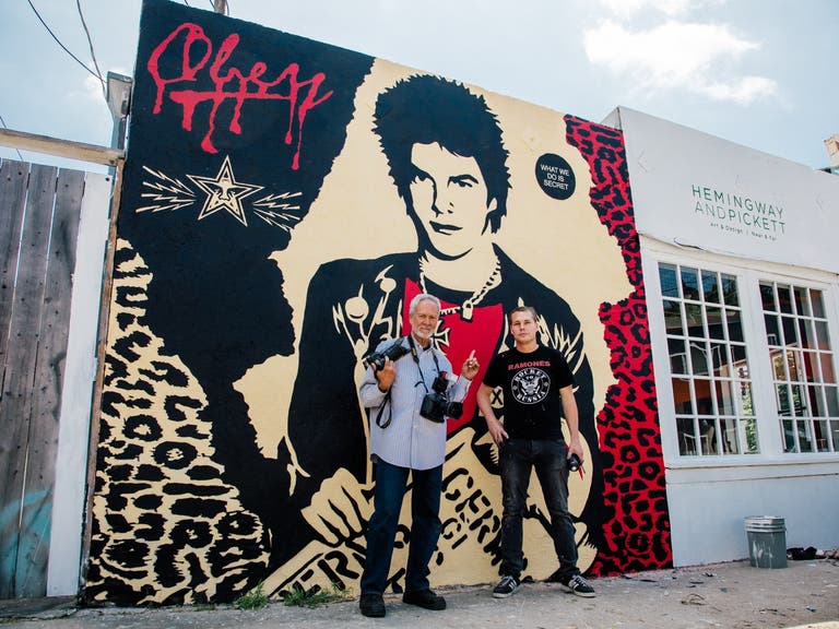 Gary Leonard and Shepard Fairey in front of the restored Darby Crash mural | Photo: Obey Giant