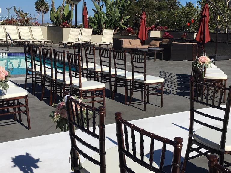 Poolside wedding ceremony at the Crowne Plaza Los Angeles Harbor in San Pedro