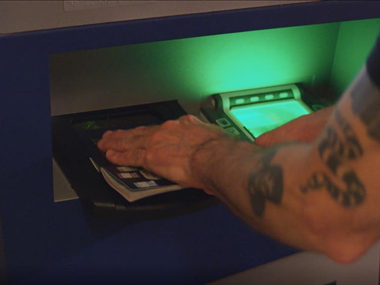 Henry Rollins uses the Global Entry Kiosk at Tom Bradley International in LAX
