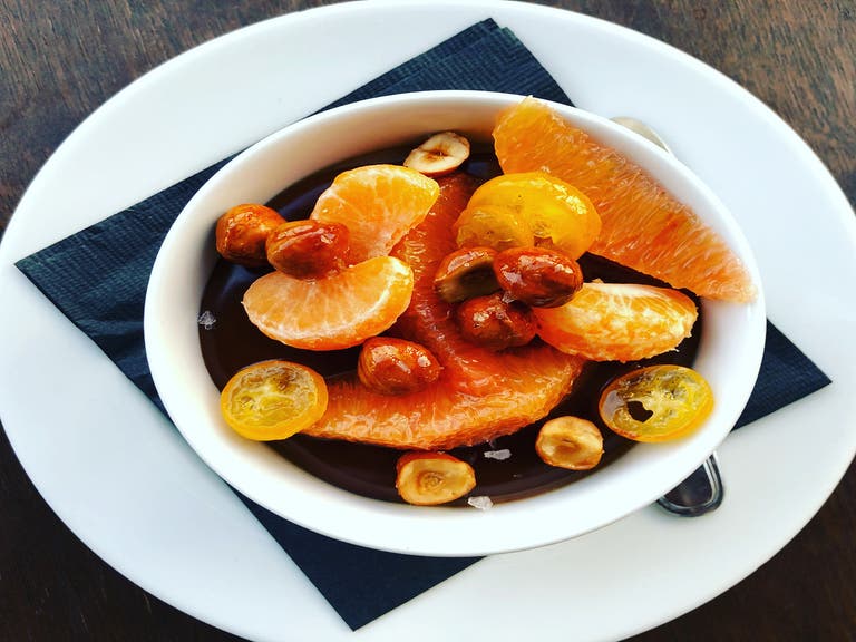 Chocolate hazelnut panna cotta with market citrus at Augustine | Instagram by @augustinewinebar